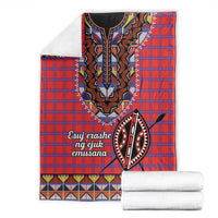 Red plaid shuka blanket flat with black-and-white beaded motif and geometric bottom trim