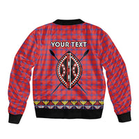 Red plaid bomber jacket back with large beadwork cat symbol and 'YOUR TEXT', black ribbed hem