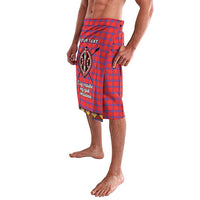Red-and-blue plaid wrap skirt with printed beadwork emblem and side tie