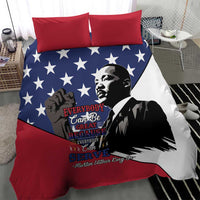 Patriotic bedding set with blue star quilt design and MLK portrait, two red pillow covers