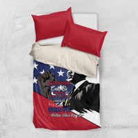 Patriotic bedding set with folded duvet showing blue stars, red trim, MLK portrait, two red pillows