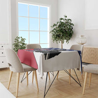 Patriotic tablecloth draped over table, red and blue panels with star shapes