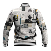 White baseball jacket with newspaper collage print, striped ribbed cuffs and hem