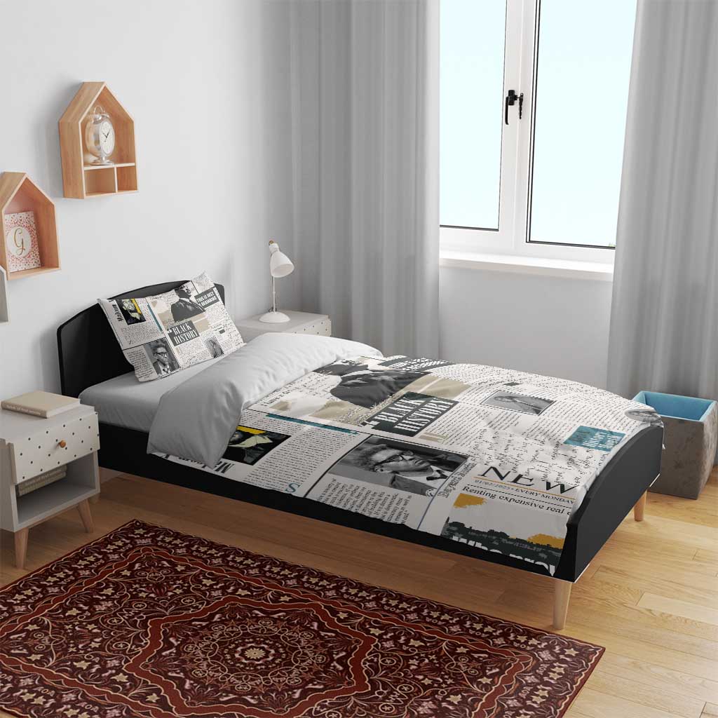Newspaper print duvet cover with black-and-white portrait collage pattern on bed