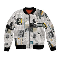 Newspaper-print bomber jacket with black ribbed collar, cuffs, and hem, red lining