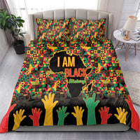 Colorful I AM Black bedding set featuring graphic map and raised hand silhouettes.