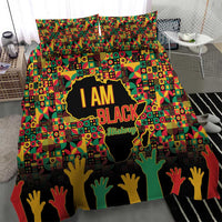I AM Black bedding set with bold lettering, map graphic, and multicolor hands.