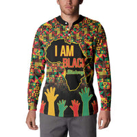 Men's button sweatshirt on model with colorful geometric print and 'I AM BLACK History' front