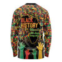 Unisex black long-sleeve shirt with colorful patterned border, Black History text, yellow hands