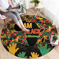 Round graphic history rug with I AM BLACK text, African map silhouette, multicolor hands