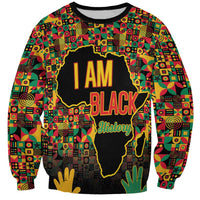 Unisex Black History Month sweatshirt with colorful geometric print and “I AM BLACK History”