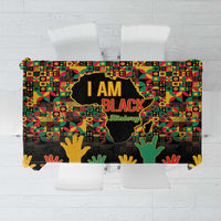 Rectangular tablecloth with bold “I AM BLACK” graphic and multicolor African pattern
