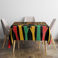 Rectangular tablecloth on table with vertical stripe design and raised hand silhouettes