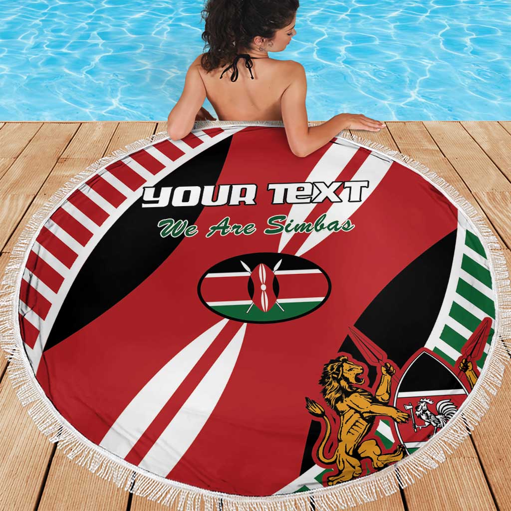 Round red Simba flag beach blanket with white fringe, custom text and central oval emblem.