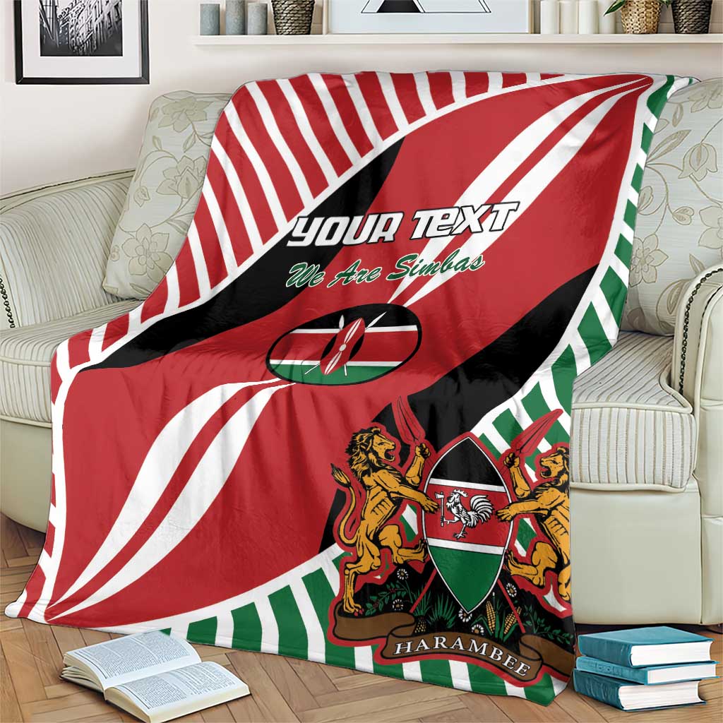 Red Kenya rugby blanket with diagonal rays, lions crest, and 'YOUR TEXT' lettering