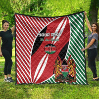 Kenya flag style quilt blanket draped outdoors with red, white, green stripes and crest