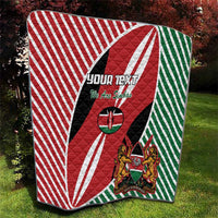 Kenya flag style quilt blanket with red, white, green striped pattern and crest shield