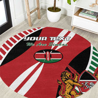 Round rugby flag-style carpet with red, black, green accents and lion crest