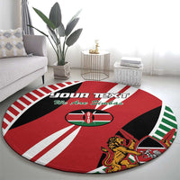 Round rugby flag-style rug with red center, black bands, white stripes, and lion crest