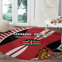 Round rugby flag-style carpet with red, black, and green detailing plus lion emblem