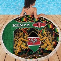 Round beach blanket with Kenya text, lion coat of arms, multicolor kente design, fringe