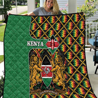 Green Kenya kente quilt with multicolor border and crest shield design