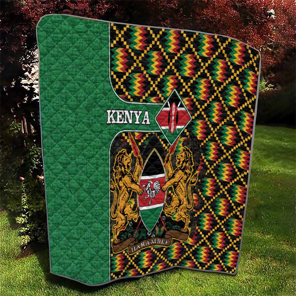 Green Kenya kente quilt with crest shield, lions, and zigzag multicolor border