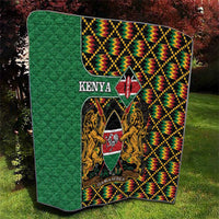 Green Kenya kente quilt with crest shield, lions, and zigzag multicolor border
