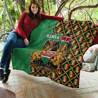 Green Kenya kente quilt with Kenya crest, lions, and multicolor geometric border
