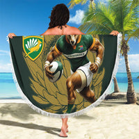Round green beach blanket with white fringe, rugby mascot and shield logo, 'YOUR TEXT' center