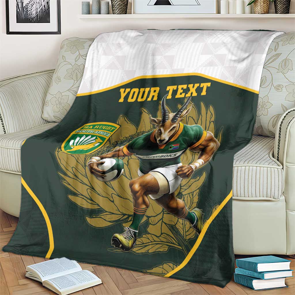 Personalised rugby mascot blanket on cream couch, dark green front with white backing