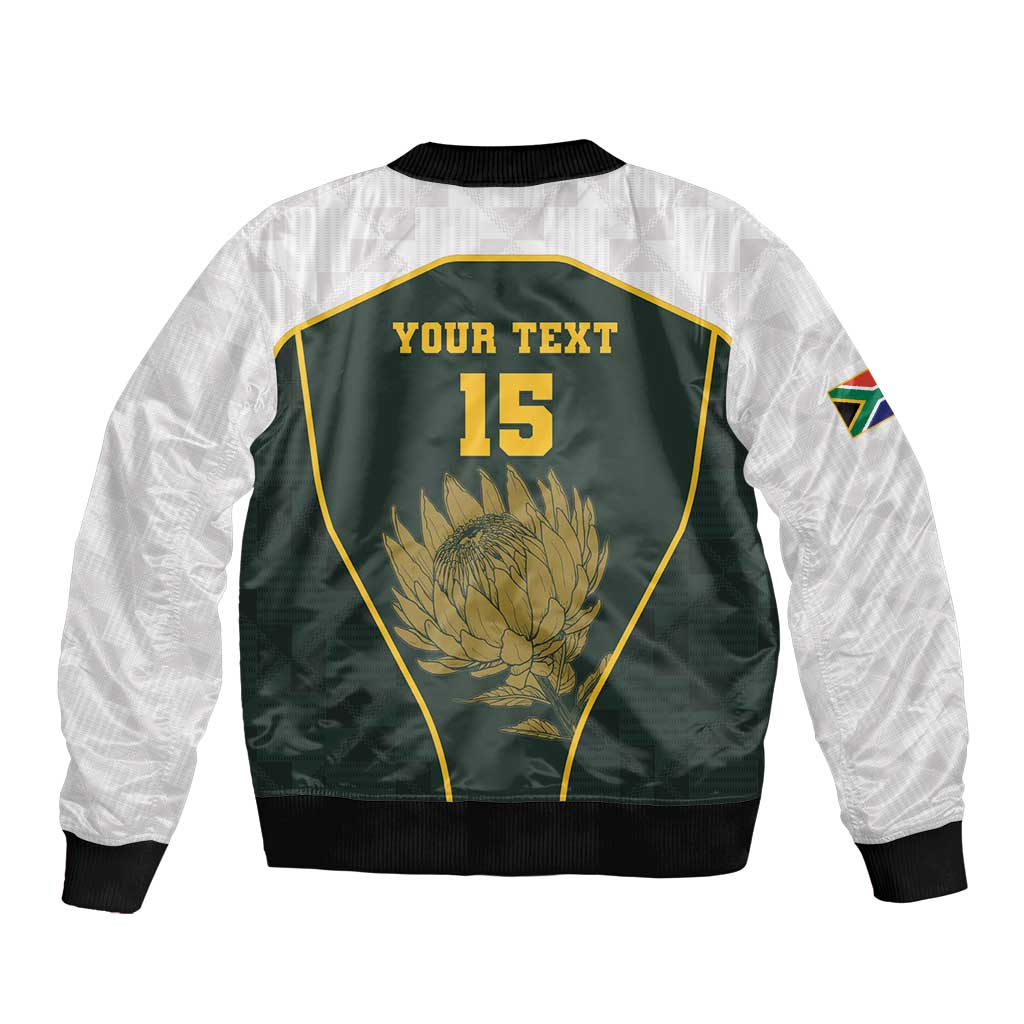 Back view green bomber jacket with floral emblem, number 15, white sleeves, ribbed cuffs