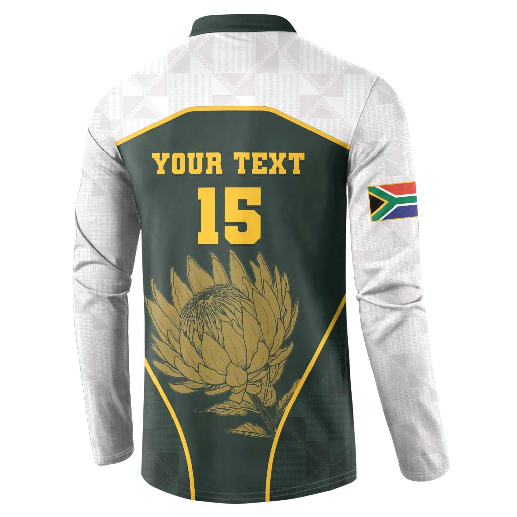 Back of green rugby-style button sweatshirt with YOUR TEXT 15 and protea emblem
