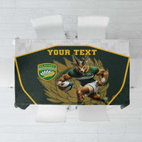Green tablecloth with yellow border and rugby mascot, personalized text panel