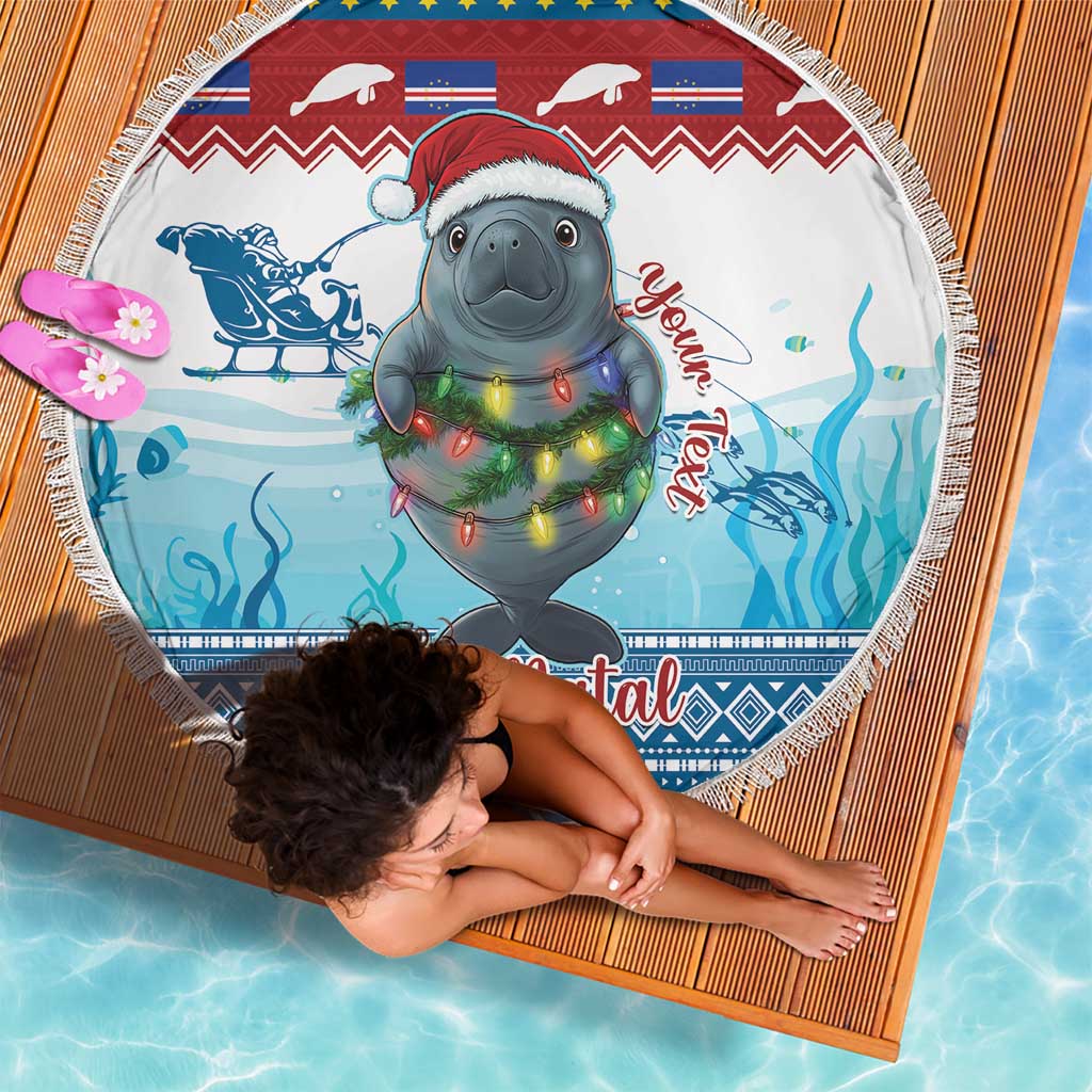 Round beach blanket held open, manatee in Santa hat on blue sea print with Feliz Natal