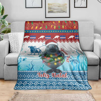 Blue Christmas throw blanket with manatee graphic, festive lights, and “Feliz Natal”