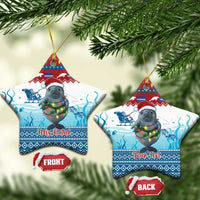 Blue ceramic star ornaments with manatee and glowing lights, “Feliz Natal” and “Your Text”