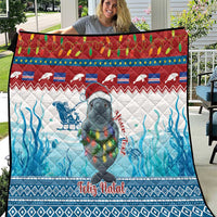 Blue Christmas quilt with manatee, Feliz Natal text, and red-green patterned top border
