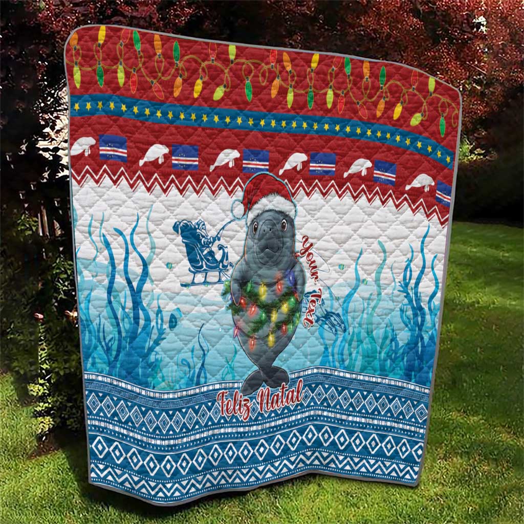 Blue Christmas quilt with manatee, Feliz Natal lettering, and ocean wave motif with borders