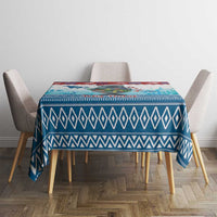 Blue geometric tablecloth with manatee artwork, square top drape on dining table
