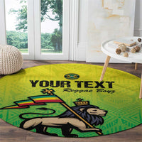 Green round rug with reggae graphic and 'Your Text' lettering near window