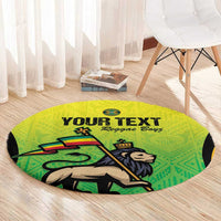 Green round rug with reggae graphic and 'Reggae Boys' text, visible edge