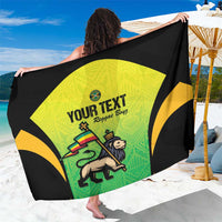 Custom football-style sarong with green, yellow, and black graphic and “Your Text”