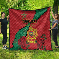Red quilt with green Morocco map, floral roses, gold crest, and custom text