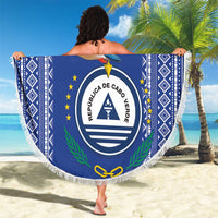 Personalized round beach blanket with white fringe, blue; coat of arms and bird design.