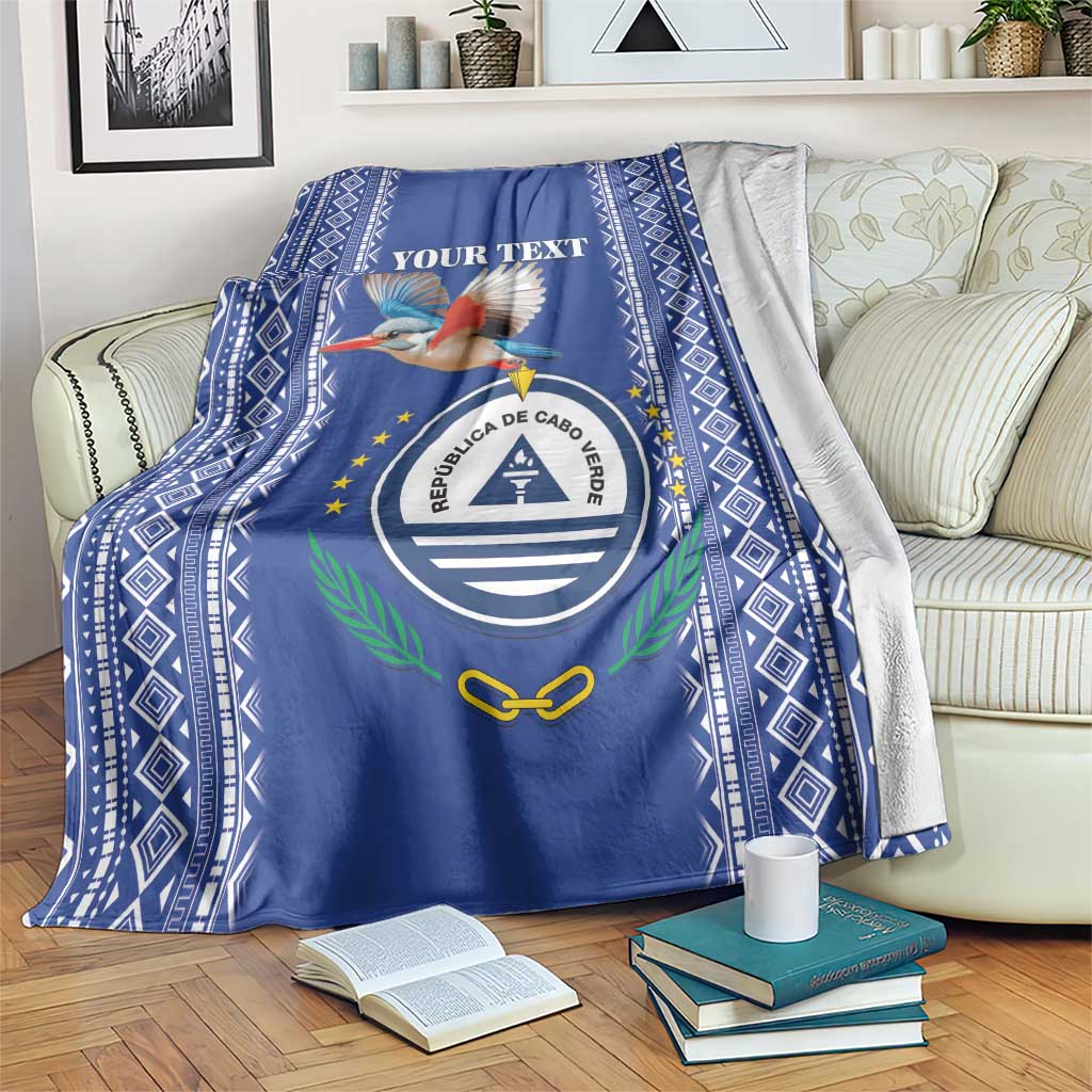Personalized blue blanket with bird and crest emblem, diamond border, gray reverse side