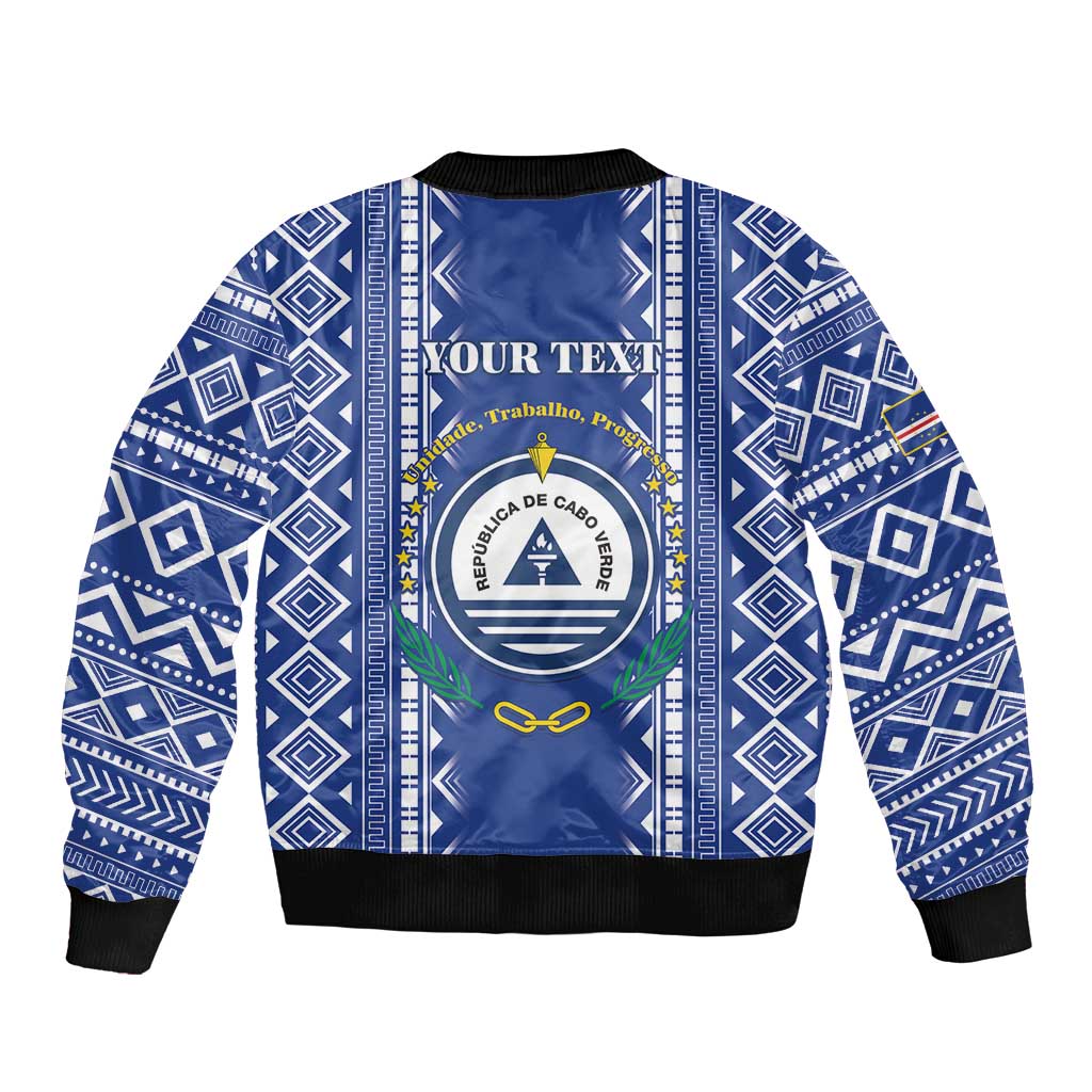 Blue patterned bomber jacket with zip front, crest, laurel and text panel