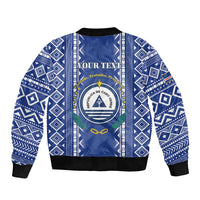 Blue patterned bomber jacket with zip front, crest, laurel and text panel