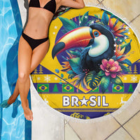 Round beach blanket with toucan centerpiece and BRASIL lettering, white fringed edge
