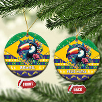 Round ceramic Christmas ornament with toucan artwork and Brasil and Feliz Natal lettering.